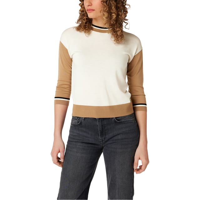 100% Wol. Ontwerp: Kleurenblok, Effen. Hem: Ribben. Halslijn: Crew Neck, Ribbed. Drop Shoulder. Mouwtype: Raglan met lange mouwen, Raglan met lange mouwen. Manchet: Ribbel. Pasvorm: Recht model. Bevestiging: Trek aan de achterkant. 8 UK: 32 in. 10 VK: 33 in.