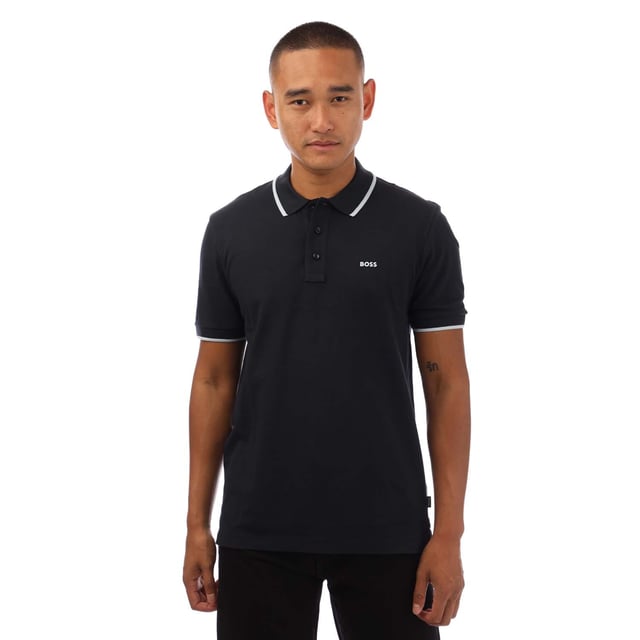 Mens Boss Parlay 190 Polo Shirt in dark blue.- Ribbed polo collar.- Short sleeves with ribbed cuffs.- Three branded button placket.- Tipping design.- Rubberised BOSS logo.- Side vents at the hem with a longer reverse.- Ref: 50494697409