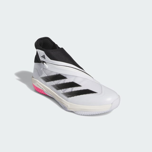 Get after your practice sessions at top speed in these turf training shoes from adidas Baseball. Built for totally locked-down comfort, these shoes feature a unique bungee lacing system with a zipper cover. Ultralight Lightstrike Pro provides comfort and support without adding bulk, while the nubbed rubber outsole gives you confident traction in the batting cage, the weight room or shagging fly balls.This product features at least 20% recycled materials. By reusing materials that have already been created, adidas help to reduce waste and our reliance on finite resources and reduce the footprint of the products adidas make.  - Regular fit - Bungee lace closure with zip shroud - Textile and synthetic upper - Textile lining - Lightstrike Pro cushioning - Rubber outsole with nubs - Contains at least 20% recycled content  Shipped by adidas