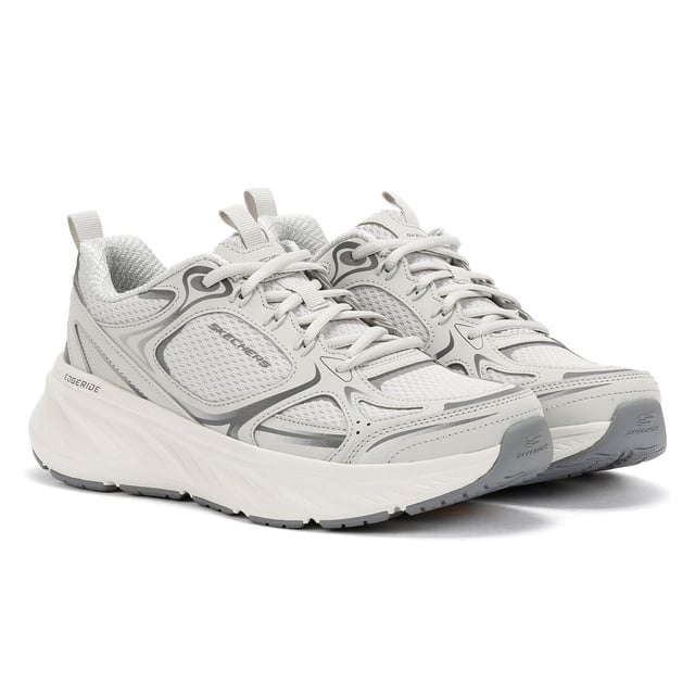 Skechers Edgeridge Dames Grijze Sneakers Skechers Hands Free Slip-ins®. Deze milieuvriendelijke, veganistische sportsneaker is gemaakt van gerecyclede materialen en heeft een ademend stretchgebreid bovenwerk met vaste stretchveters voor gemakkelijk aantrekken. Ontworpen voor de hele dag ondersteuning, het bevat een goed gedempte tussenzool en een Skechers Air-Cooled Memory Foam® inlegzool voor superieur comfort en luchtcirculatie. Perfect voor wandelen, reizen en dagelijks gebruik.