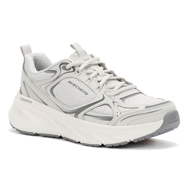 Skechers Edgeridge Dames Grijze Sneakers Skechers Hands Free Slip-ins®. Deze milieuvriendelijke, veganistische sportsneaker is gemaakt van gerecyclede materialen en heeft een ademend stretchgebreid bovenwerk met vaste stretchveters voor gemakkelijk aantrekken. Ontworpen voor de hele dag ondersteuning, het bevat een goed gedempte tussenzool en een Skechers Air-Cooled Memory Foam® inlegzool voor superieur comfort en luchtcirculatie. Perfect voor wandelen, reizen en dagelijks gebruik.