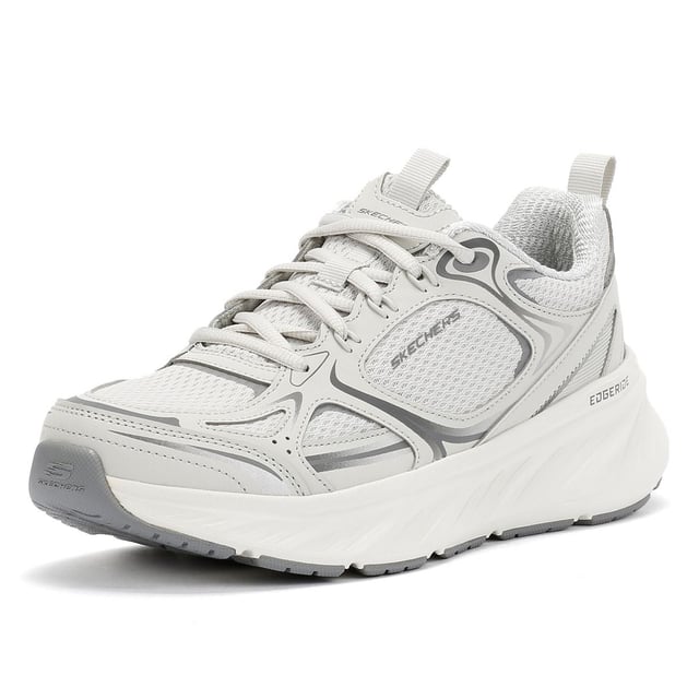 Skechers Edgeridge Dames Grijze Sneakers Skechers Hands Free Slip-ins®. Deze milieuvriendelijke, veganistische sportsneaker is gemaakt van gerecyclede materialen en heeft een ademend stretchgebreid bovenwerk met vaste stretchveters voor gemakkelijk aantrekken. Ontworpen voor de hele dag ondersteuning, het bevat een goed gedempte tussenzool en een Skechers Air-Cooled Memory Foam® inlegzool voor superieur comfort en luchtcirculatie. Perfect voor wandelen, reizen en dagelijks gebruik.