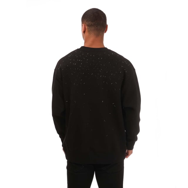 85% Baumwolle, 15% Polyester. Design: Verziert. Rundhalsausschnitt, gerippt. Langärmlig. Bündchen: gerippt. Passform: Lose. Zum Überziehen. S: 96,52 cm. M: 102 cm. L: 112 cm. XL: 121,92 cm. XXL: 132 cm.