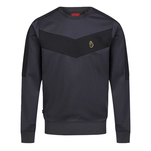 94% Polyester, 6% Elastaan. Trim: Ribben. Stof: Stretch, Tricot. Ontwerp: Chevron, Geborduurd logo. Hals: Crew Neck. Gesneden en genaaid paneel, getapete schouders, getapete mouwen. Mouwtype: Met lange mouwen. Bevestiging: Trek aan de achterkant. M: 40 in. XL: 44 in. XXL: 46 in.