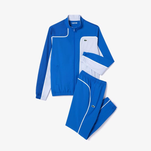 Materiaal: Gerecycleerd polyester. Stof: Diamant tafzijde, Gebreid. Ontwerp: Kleurenblok, Logo. Halslijn: Hoge Kraag. Mouwtype: Met lange mouwen. Stoftechnologie: Rekken. Bevestiging: Pull-On. Onbeperkte bewegingsvrijheid. Inhoud: 1 Broek, 1 Top. Geschikt: Regelmatig. XS: 36 in.