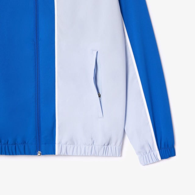Materiaal: Gerecycleerd polyester. Stof: Diamant tafzijde, Gebreid. Ontwerp: Kleurenblok, Logo. Halslijn: Hoge Kraag. Mouwtype: Met lange mouwen. Stoftechnologie: Rekken. Bevestiging: Pull-On. Onbeperkte bewegingsvrijheid. Inhoud: 1 Broek, 1 Top. Geschikt: Regelmatig. XS: 36 in.