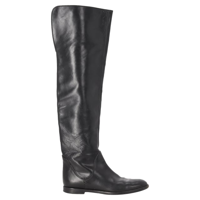 VINTAGE, RRP AS NEW
The Gianvito Rossi Slip-On Knee-High Boots in black leather exude timeless sophistication with their sleek silhouette and impeccable Italian craftsmanship. Made from supple leather, they offer a flawless fit and effortless elegance for day-to-night styling. **Styling Tip:** Wear them over skinny trousers or with a midi skirt to highlight their elongating effect and refined edge.

 Gianvito Rossi Slip-On Knee-High Boots in Black Leather

Condition: Good
Signs of wear: Moderate signs of wear or markings, moderate scuffing insoles., Used but well maintained. Moderate creasing and marks at surface, wear at soles or replaced soles.
Packaging: None
Color: Black
Material: Leather | leather
Size: IT | 36
Measurements: Heel height: 15; Insole length: 235
SKU: NAPPUITSH508985W