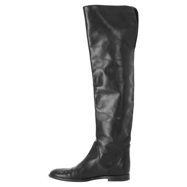 VINTAGE, RRP AS NEW
The Gianvito Rossi Slip-On Knee-High Boots in black leather exude timeless sophistication with their sleek silhouette and impeccable Italian craftsmanship. Made from supple leather, they offer a flawless fit and effortless elegance for day-to-night styling. **Styling Tip:** Wear them over skinny trousers or with a midi skirt to highlight their elongating effect and refined edge.

 Gianvito Rossi Slip-On Knee-High Boots in Black Leather

Condition: Good
Signs of wear: Moderate signs of wear or markings, moderate scuffing insoles., Used but well maintained. Moderate creasing and marks at surface, wear at soles or replaced soles.
Packaging: None
Color: Black
Material: Leather | leather
Size: IT | 36
Measurements: Heel height: 15; Insole length: 235
SKU: NAPPUITSH508985W