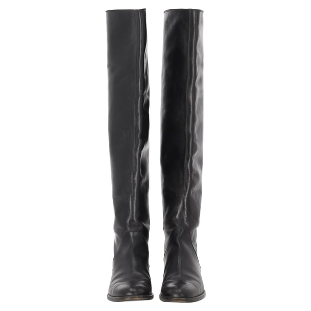 VINTAGE, RRP AS NEW
The Gianvito Rossi Slip-On Knee-High Boots in black leather exude timeless sophistication with their sleek silhouette and impeccable Italian craftsmanship. Made from supple leather, they offer a flawless fit and effortless elegance for day-to-night styling. **Styling Tip:** Wear them over skinny trousers or with a midi skirt to highlight their elongating effect and refined edge.

 Gianvito Rossi Slip-On Knee-High Boots in Black Leather

Condition: Good
Signs of wear: Moderate signs of wear or markings, moderate scuffing insoles., Used but well maintained. Moderate creasing and marks at surface, wear at soles or replaced soles.
Packaging: None
Color: Black
Material: Leather | leather
Size: IT | 36
Measurements: Heel height: 15; Insole length: 235
SKU: NAPPUITSH508985W
