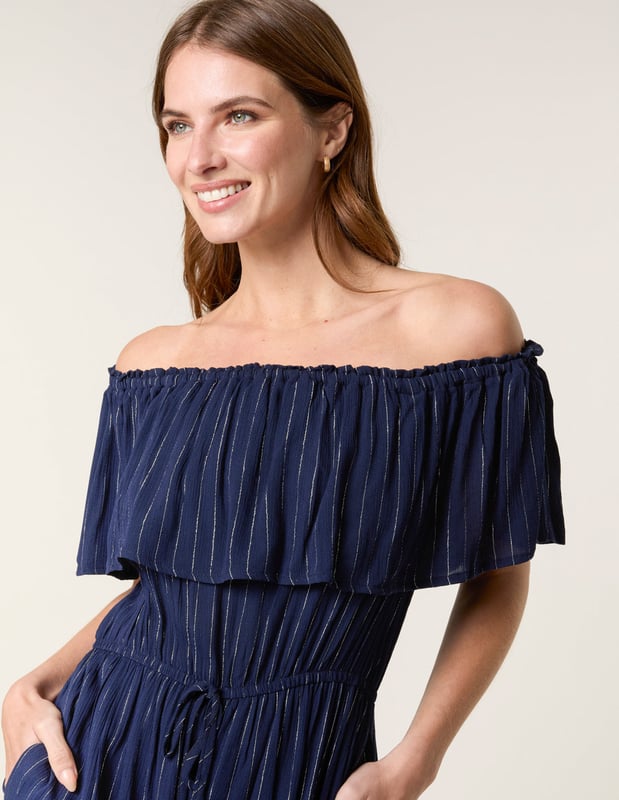A light, breezy jumpsuit to wear this summer. Team with white trainers and a denim jacket for the perfect everyday look.     