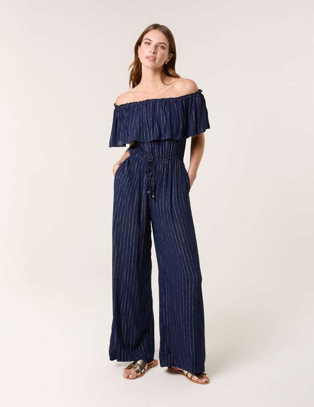A light, breezy jumpsuit to wear this summer. Team with white trainers and a denim jacket for the perfect everyday look.     