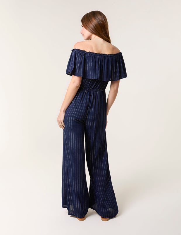 A light, breezy jumpsuit to wear this summer. Team with white trainers and a denim jacket for the perfect everyday look.     