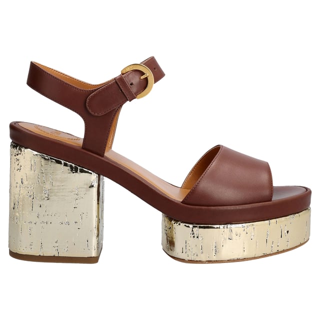 Chloé Odina Leather Sandals Composition: 100% calf leather
Inner: Leather
Insole: Leather
Sole: Leather
Heel: 10.0 cm / 25.4 in
Platform: 4.0 cm / 10.16 in
round toe
Logo ankle buckle closure
patent side detail
Gender: WOMEN
Product code: CHC23U783D9_25L
Code: SHO CI 2 SN SS P00001 059
Measurments: height: 254 mm