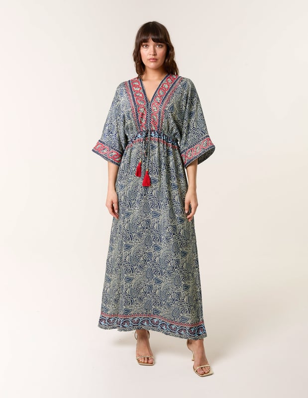 A kimono style maxi dress perfect to pack for your next summer holiday. Tassels, embellishment and abstract prints this dress really does have it all!     