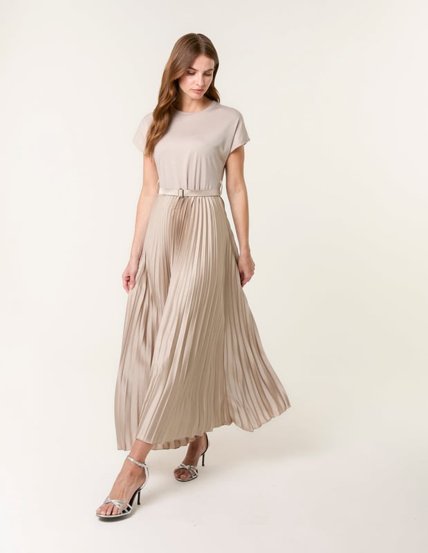 Jazz up your casual day to day look with this pleated dress. It's super soft and comfy but ensures to add some trend to your outfit for the day.     
