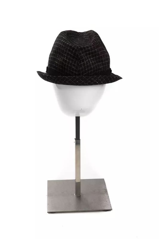 Classic Wool Hat
  Made from premium virgin wool
  Timeless black color
  Designed for women
Material: 61% Virgin Wool 25% Polyamide 9% Cotton 3% Silk 2% Elastane
