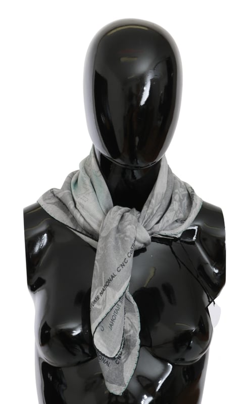 100% silk scarf from CNC Costume National
  Gray printed design
  Logo details
  Made in Italy
  Dimensions: 65cm x 65cm
  Suitable for women
Material: 100% Silk