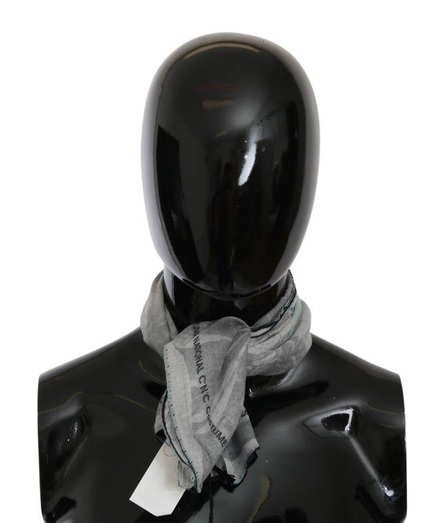 100% silk scarf from CNC Costume National
  Gray printed design
  Logo details
  Made in Italy
  Dimensions: 65cm x 65cm
  Suitable for women
Material: 100% Silk