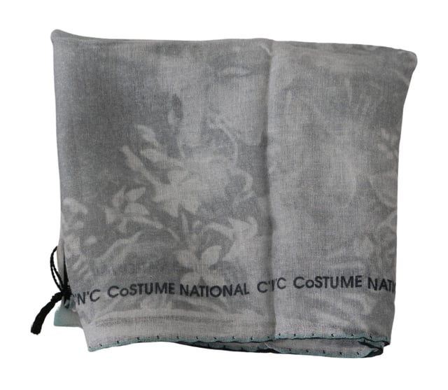 100% silk scarf from CNC Costume National
  Gray printed design
  Logo details
  Made in Italy
  Dimensions: 65cm x 65cm
  Suitable for women
Material: 100% Silk