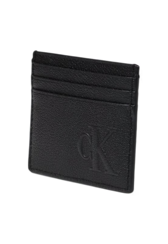 Brand: Calvin Klein Jeans
  Gender: Men
  Type: Wallets
  Season: Spring/Summer
  Color: black
  Pattern: plain
  Size (cm): 8x10.5x0.5
  Article code: LV04G1024G
Material: Leather