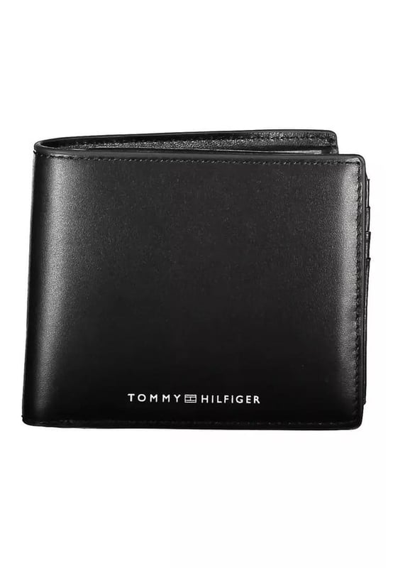 Product: Black Leather Wallet
  Brand: Tommy Hilfiger
  Material: 100% Leather
  Color: Black
  Features: Dual compartments practical coin purse ample space for cards
  Iconic logo with contrasting details
  Country of Origin: CN
  Gender: Men