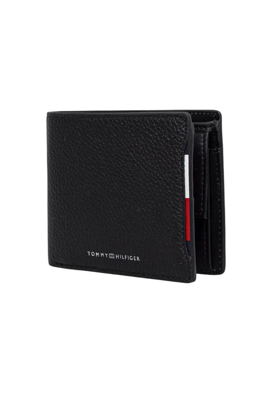Marca: Tommy Hilfiger.
  Genero: Hombres.
  Tipo: Carteras.
  Temporada: Otono/Invierno.
  Color: negro.
  Patron: estampado.
  Bolsillos: bolsillos interiores.
  Tamano (cm): 10x12x1.5.
  Codigo del articulo: AM0AM13514.
  Composicion: 100% cuero.