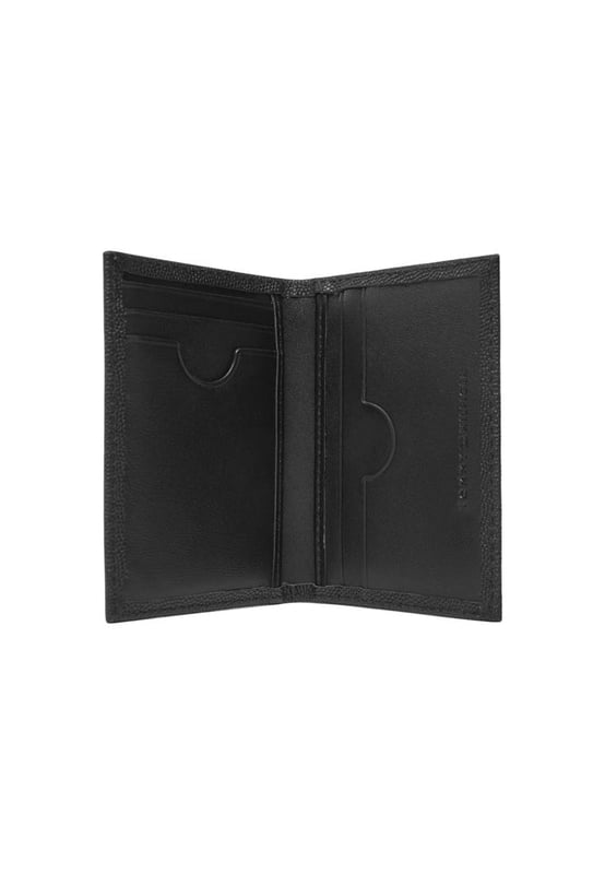 Marca: Tommy Hilfiger.
  Genero: Hombre.
  Tipo: Carteras.
  Temporada: Otono/Invierno.
  Color: negro.
  Tamano (cm): 10.5x8x1.
  Detalles: compartimentos interiores.
  Codigo del articulo: AM0AM13522.
  Composicion: 100% cuero.