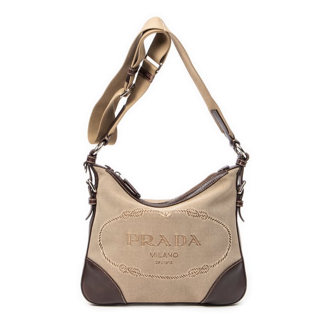 Prada Taschen Jacquard Zip Crossbody  Umhängetasche und Beige/Braun Leinwand und Silber hardware. Das Produkt ist auf in ausgezeichnetem Zustand (A).
  Abmessungen: 27x22x2 cm 
  Zubehör inklusive: None
  Äußere Hinweise: Leichte Kratzer an der Außenkarosserie
  BrandCo Paris hat seltene Artikel und die besten Konditionen zu unglaublichen Preisen vorgestellt. Geduld lohnt sich! Kaufen Sie mit Vertrauen: Alle Artikel von BrandCo Paris sind von unserem Expertenteam ausgewählt und authentisch.
  Alle Artikel enthalten ein Echtheitszertifikat und wurden von BrandCo Paris übernommen.
  Tabelle zur Klassifizierung des Artikelzustands
  N (wie neu)
  AA (perfekter Zustand)
  A (ausgezeichneter Zustand)
  AB (sehr guter Zustand)
  B (gut/mittelmäßig)