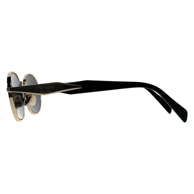 Prada Oval Womens Pale Gold Dark Grey PR65ZS  Sunglasses reveal a sleek, full-rim metal frame meticulously crafted for understated luxury, featuring a subtly rounded shape that exudes effortless refinement while ensuring lightweight comfort.