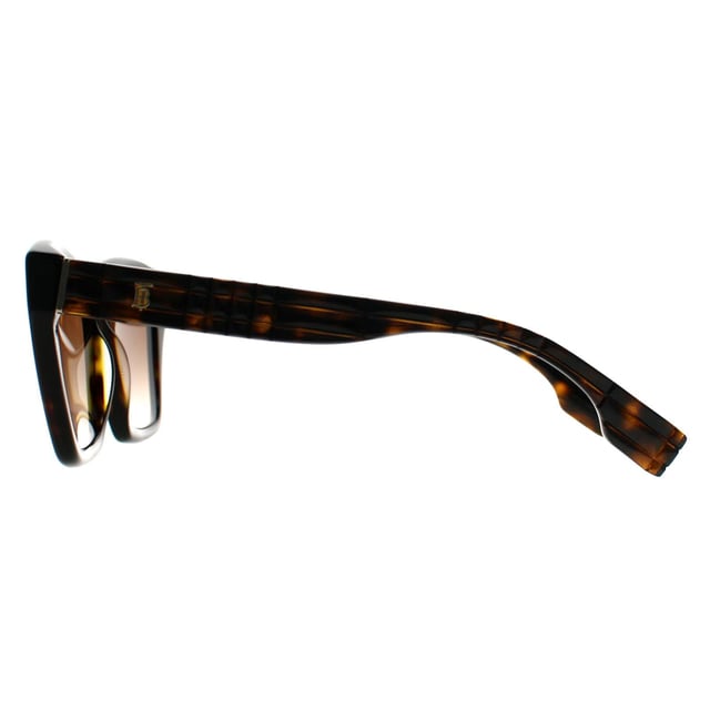 Las gafas de sol Burberry Cat Eye Womens Dark Tortoise Brown Gradient BE4391 Arden presentan una atrevida silueta de mariposa cuadrada elaborada en acetato de primera calidad que ofrece un look llamativo a la par que refinado. Equipadas con lentes que ofrecen protección UV total, equilibran la funcionalidad diaria con el atractivo atemporal de la alta costura.