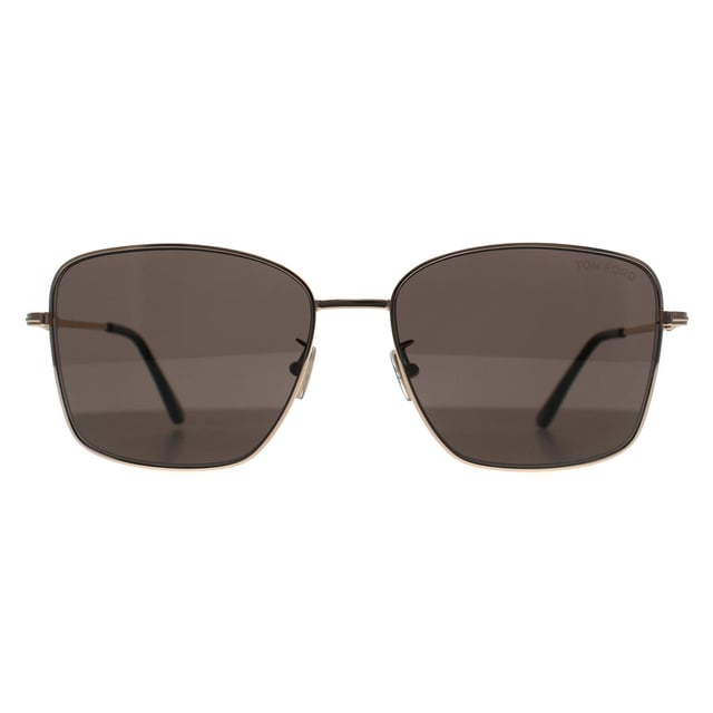 Tom Ford Square Womens Shiny Rose Gold Smoke Grey FT0953-D  Sunglasses is a refined aviator-style sunglass crafted in Italy from sleek metal, graced with a polished gold (or rose-gold) frame and matching bridge. The lenses offer full UV protection and classic Tom Ford branding, the FT0953â€‘D blends vintage aviation charm with modern eleganceâ€”ideal for those seeking timeless luxury with everyday practicality.