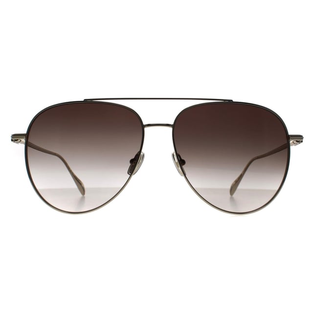 Salvatore Ferragamo Aviator Mens Light Gold Brown Gradient SF308S  Sunglasses feature a classic aviator shape with a refined metal frame and sleek double bridge. Designed with minimalist detailing and subtle Ferragamo branding at the temples, they offer full UV protection and a lightweight, comfortable fit â€“ ideal for a timeless, polished look.