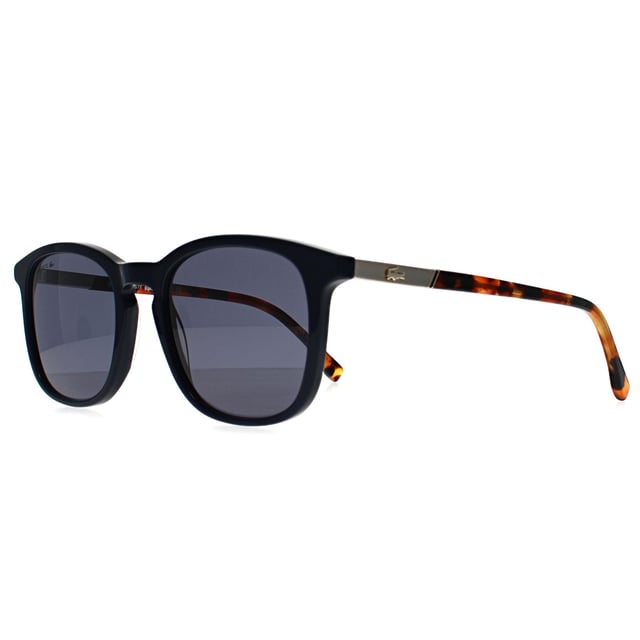 Lacoste Rectangle Unisex Blue Blue L961S Lacoste Rectangle Unisex Blue Blue L961S Sunglasses are a sleek embodiment of athletic elegance and modern style. Crafted for the unisex trendsetter, these sunglasses boast an all-blue aesthetic that harmoniously blends youthful energy with timeless sophistication. The lightweight plastic frames provide comfortable, all-day wear—ideal for those who balance sport and leisure effortlessly. Featuring category 3 lenses, they offer superior protection against bright sunlight while ensuring clear vision on or off the court. Subtle nods to Lacoste's iconic French heritage are visible in every detail, from the signature crocodile logo to their streamlined design inspired by classic tennis culture. Elevate your everyday look with eyewear that champions both performance and poised grace.