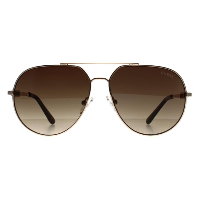 Guess Aviator Womens Gold Brown GF6195  Sunglasses feature smooth lines and a flattering frame. Ideal for everyday use, they bring an elevated touch to any outfit.