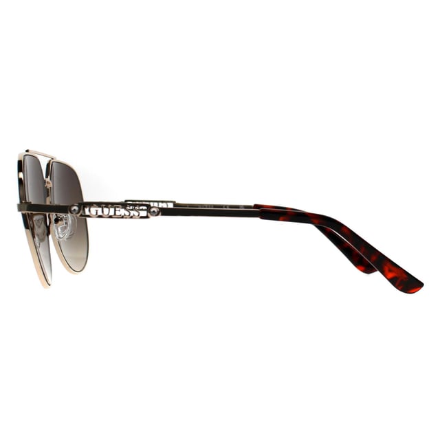 Guess Aviator Womens Gold Brown GF6195  Sunglasses feature smooth lines and a flattering frame. Ideal for everyday use, they bring an elevated touch to any outfit.