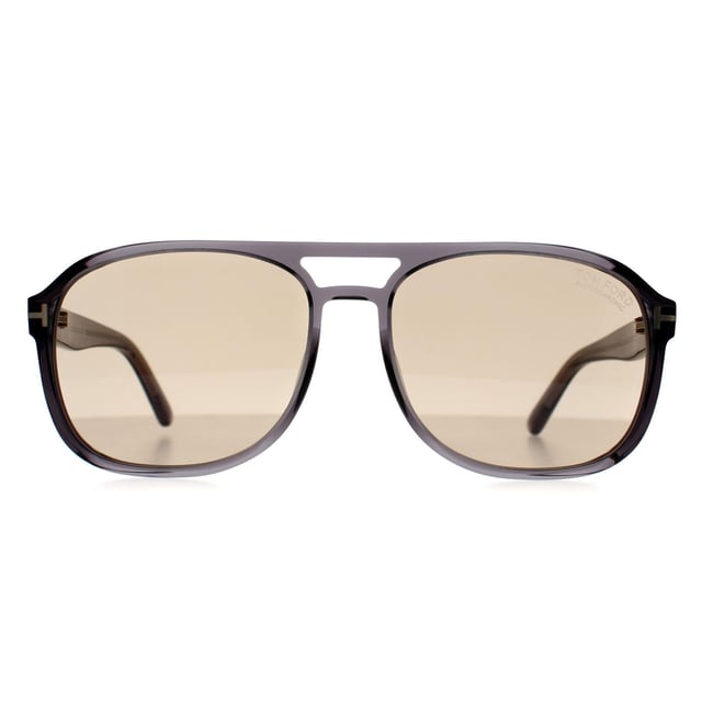 Tom Ford Aviator Mens Grey Crystal Light to Dark Brown Photochromic Rosco FT1022  Sunglasses blend classic aviator style with a modern edge. Featuring a bold double bridge and the signature T logo on the temples, they offer a sophisticated and confident look. Made from high-quality acetate, theyâ€™re lightweight, durable, and perfect for everyday wear.