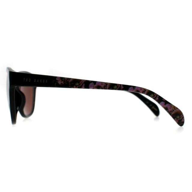 Ted Baker Cat Eye Womens Gloss Black Flowers Brown TB1605 Las gafas de sol Amie son un estilo cat eye a la moda fabricado en acetato ligero. El logotipo de Ted Baker aparece en las patillas delgadas para dar autenticidad a la marca.