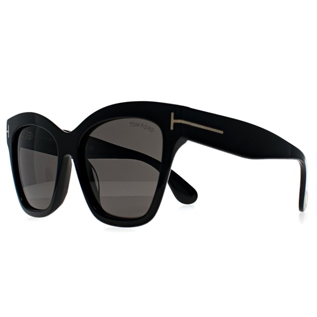 Tom Ford Butterfly Womens Shiny Black Grey with Light Mirror Elvira FT1217  Sunglasses bring a bold, sculpted butterfly shape to life with sleek lines and a confident silhouette. Made from high-quality acetate, they feature the signature metal 'T' detailing at the temples, adding a refined edge to the dramatic frame. Designed to stand out, they balance statement style with everyday sophistication, offering full eye coverage and dependable UV protection.