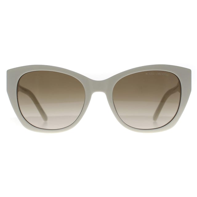 Marc Jacobs Cat Eye Womens Ivory Brown Gradient MARC 732/S  Sunglasses exude a harmonious blend of timeless sophistication and modern allure. Crafted with meticulous attention to detail, the frame boasts a sleek and distinct silhouette that seamlessly combines premium materials for durability and all-day comfort. The lenses, renowned for their quality, not only make a style statement but also offer reliable protection against harmful UV rays. Adorned with the hallmark Marc Jacobs branding, these sunglasses encapsulate refined elegance and enduring style, making them a staple for those seeking to effortlessly elevate their fashion ensemble with a dash of luxury and panache.
