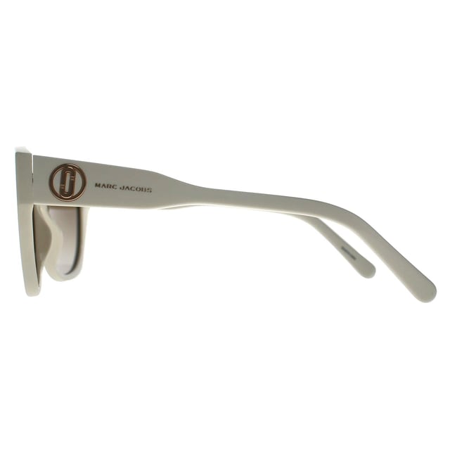 Marc Jacobs Cat Eye Womens Ivory Brown Gradient MARC 732/S  Sunglasses exude a harmonious blend of timeless sophistication and modern allure. Crafted with meticulous attention to detail, the frame boasts a sleek and distinct silhouette that seamlessly combines premium materials for durability and all-day comfort. The lenses, renowned for their quality, not only make a style statement but also offer reliable protection against harmful UV rays. Adorned with the hallmark Marc Jacobs branding, these sunglasses encapsulate refined elegance and enduring style, making them a staple for those seeking to effortlessly elevate their fashion ensemble with a dash of luxury and panache.