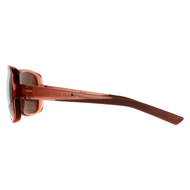 Nike Butterfly Womens Fossil Rose Rose Gold Mirror Audacious S FD5094  Sunglasses feature an oversized, full-frame design crafted from bio-injected plastic for lightweight durability. Designed with a saddle bridge and straight temples enhanced with grip detailing, they offer both comfortable wear and secure fitâ€”ideal for sporty, fashion-forward looks.