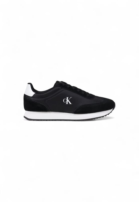 Brand: Calvin Klein Jeans
  Gender: Women
  Type: Sneakers
  Season: Fall/Winter
  Color: Black
  Fastening: Laces
  Article code: YW0YW01828
  Composition: 100% leather
Material: Textile & Suede