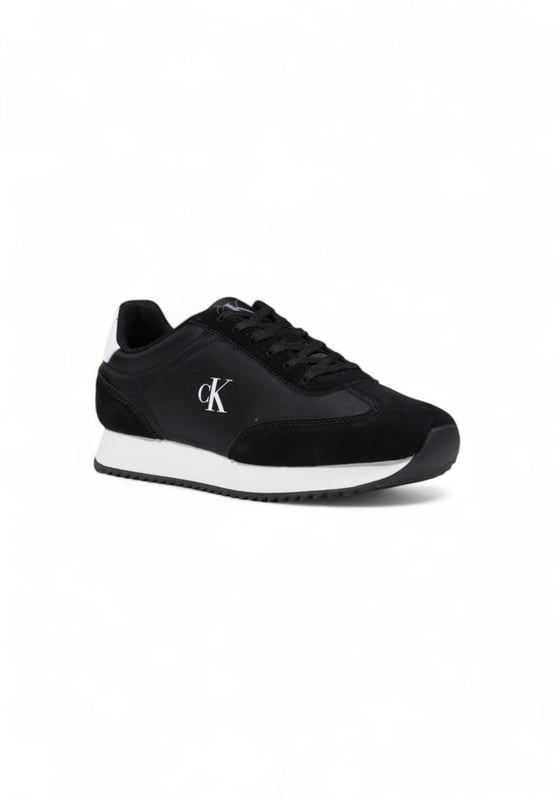 Brand: Calvin Klein Jeans
  Gender: Women
  Type: Sneakers
  Season: Fall/Winter
  Color: Black
  Fastening: Laces
  Article code: YW0YW01828
  Composition: 100% leather
Material: Textile & Suede