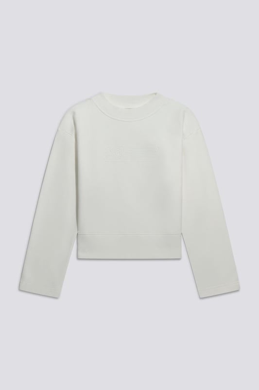 Sudadera de cuello redondo recortado para mujer con logotipo estampado brillante: una mezcla de comodidad y frescura irresistible.   Características principales:  Forro polar cepillado con lavado híbrido Corte recto Logotipo brillante