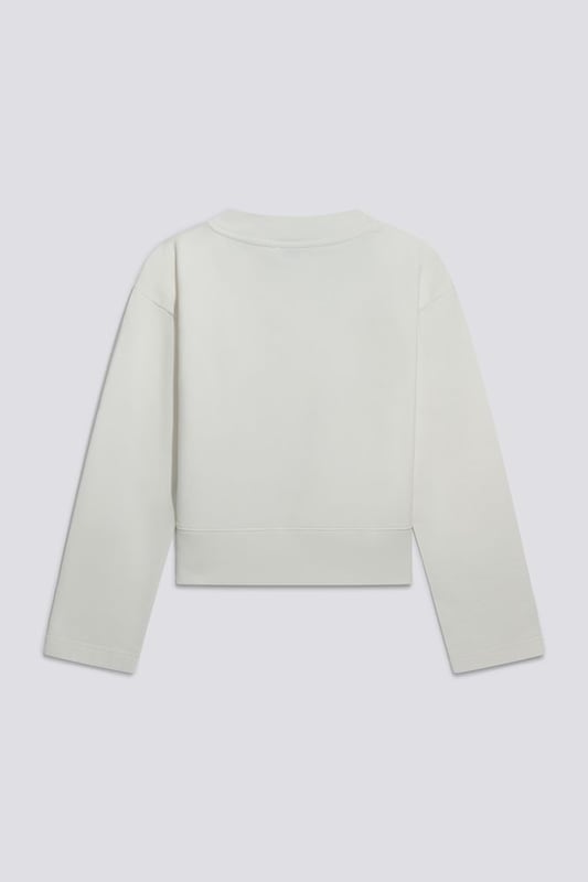 Sudadera de cuello redondo recortado para mujer con logotipo estampado brillante: una mezcla de comodidad y frescura irresistible.   Características principales:  Forro polar cepillado con lavado híbrido Corte recto Logotipo brillante