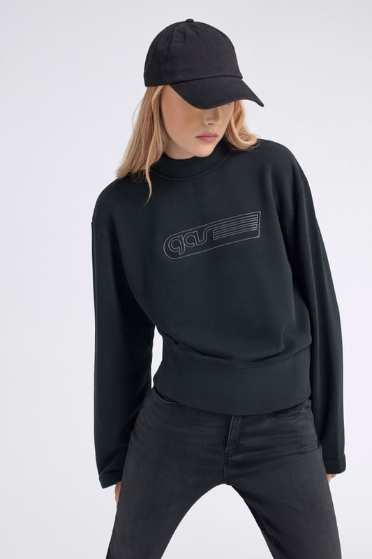 Damen-Sweatshirt mit Rundhalsausschnitt und glänzendem Logo-Print: eine unwiderstehliche Mischung aus Komfort und Coolness.   Hauptmerkmale:  Gebürstetes Fleece mit Hybrid-Waschung Normale Passform Glänzender Logodruck