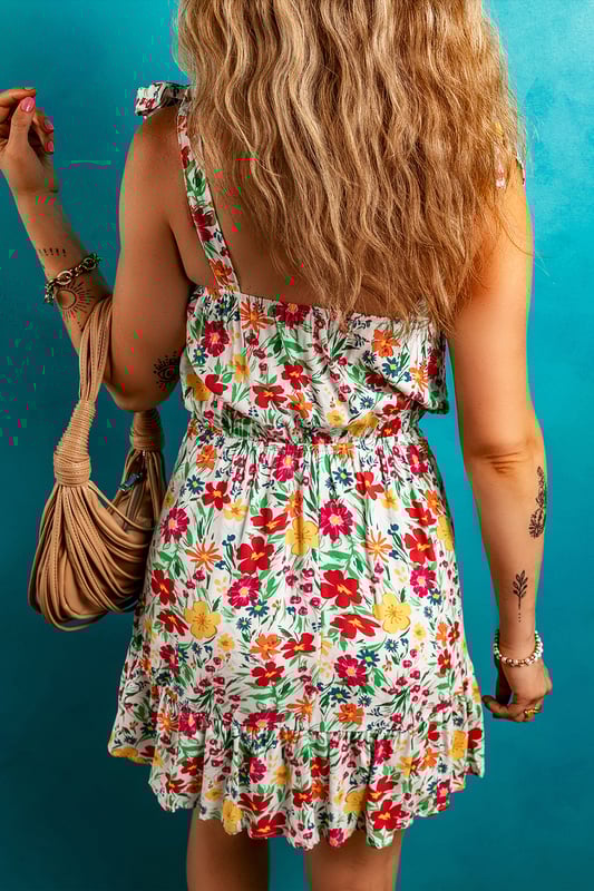 Red floral print
  Knotted straps
  Cinched waist
  Ruffled hem
  Mini length
Material: 100% Viscose
