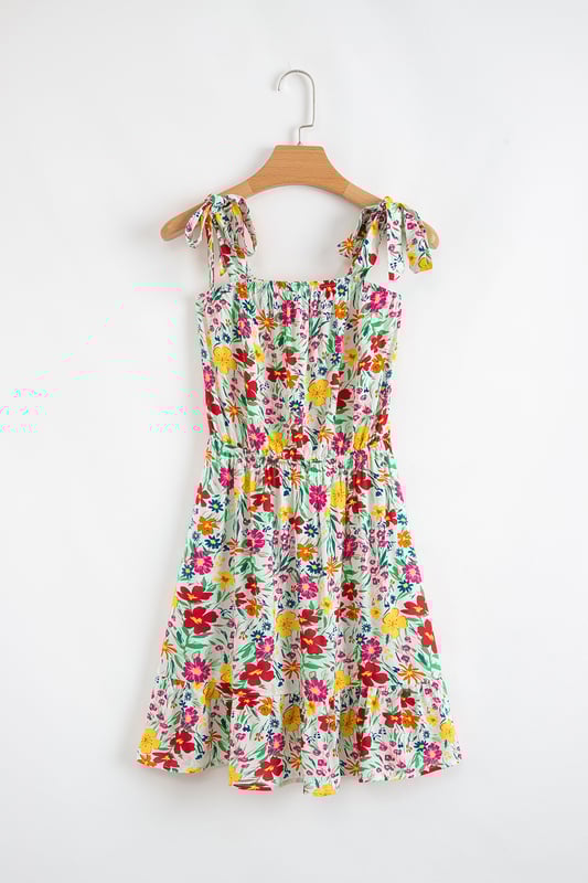 Red floral print
  Knotted straps
  Cinched waist
  Ruffled hem
  Mini length
Material: 100% Viscose