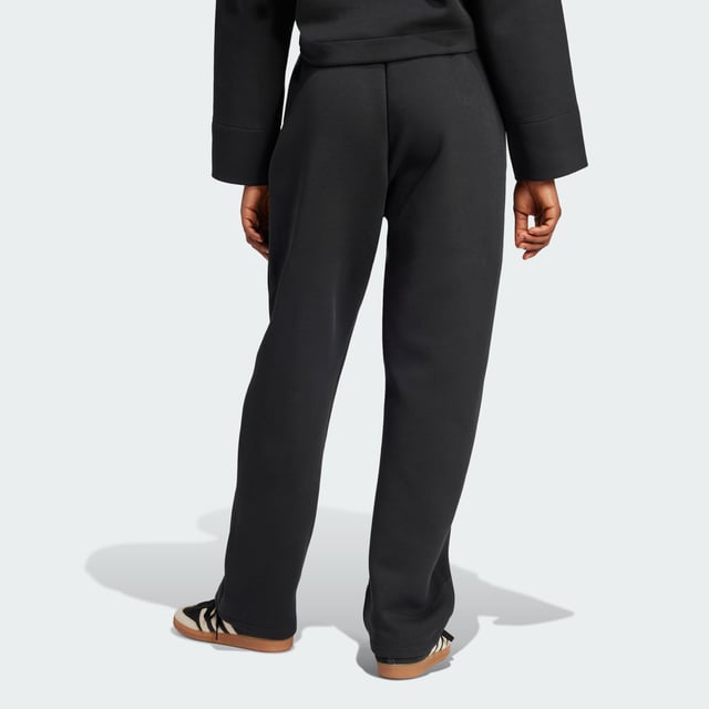 Remix your off-duty look with these adidas sweat pants. Inspired by martial arts and studio sports, they have a relaxed shape and a soft cotton-blend build that gives them an effortless vibe. Classic 3-Stripes on one leg add a signature finish to the casual design.By choosing recycled, adidas are able to reuse materials that have already been created, which helps to reduce waste. Renewable materials choices will help us to remove our reliance on finite resources. Our products made with a blend of recycled and renewable materials feature at least 70% total of these materials.  - Loose fit - Drawcord on elastic waist - 53% cotton, 47% polyester (recycled) - Side pockets - Contains a minimum of 70% recycled and renewable content  Shipped by adidas