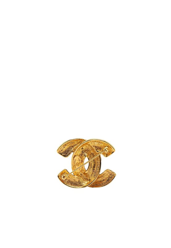 Pre-owned Chanel CC Logo Brooch This brooch features a quilted gold-plated body and a back pin closure.Brand: Chanel VintageCondition: PrelovedType: Costume BroochRating: B+Main Material: MetalDimensions (LxWxD): 3.4x4x0Comments: Exterior Back Scratched. Exterior Back stained with Other. Lock Scratched. Exterior Front Scratched.